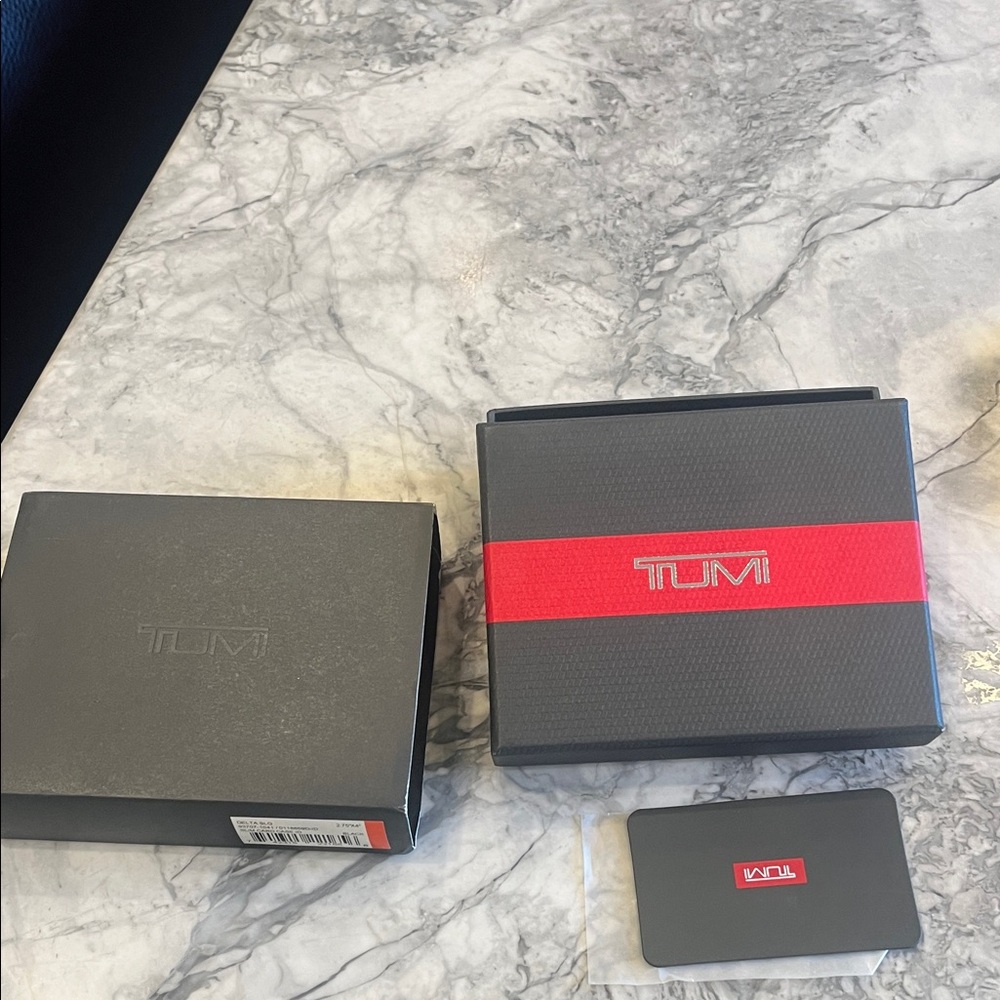 Tumi Black Box with Red Accent